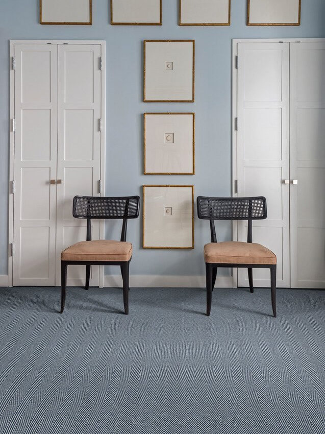 a blue wool rug resists stains & hides dirt