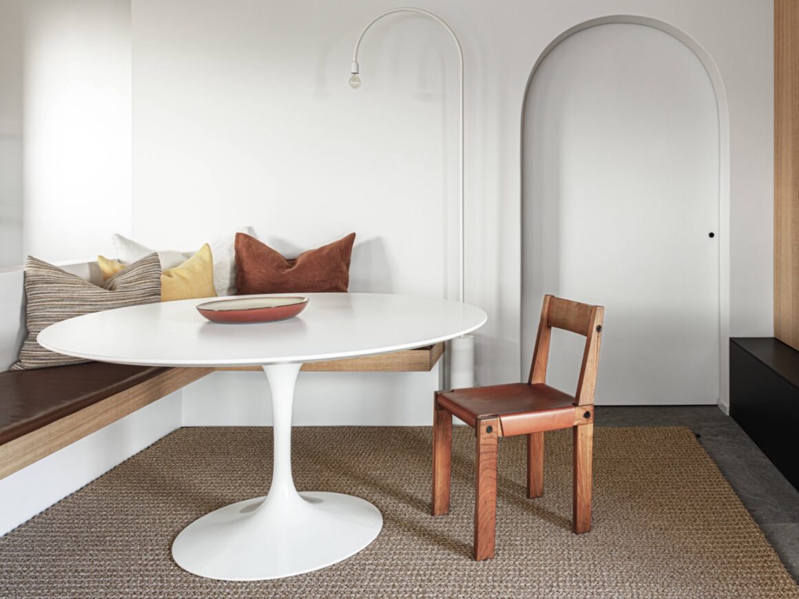 neutral colored rug in dining nook
