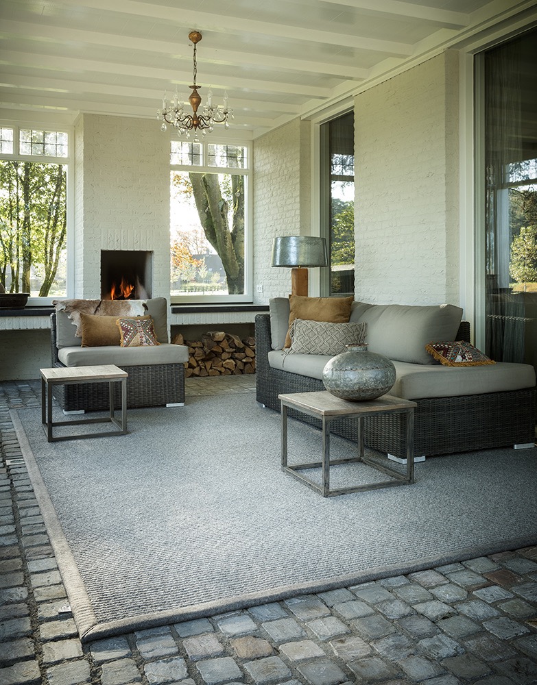 wool rug warms up covered porch on a fall day