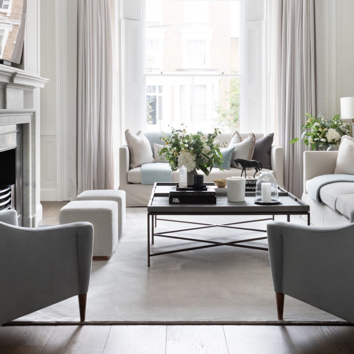 formal living room with light colored area rug