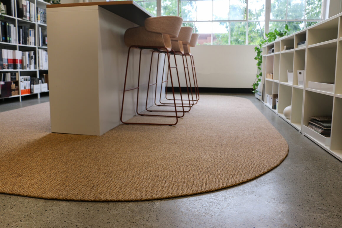 SynSisal organic oval shaped rug in Design Well Spent Seattle office
