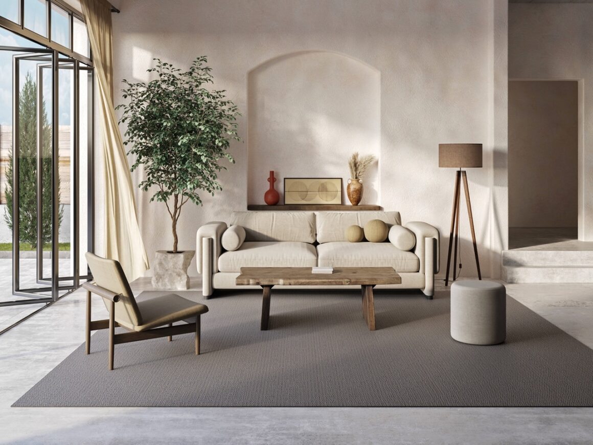 woven vinyl rug in dark grey color on gray floor